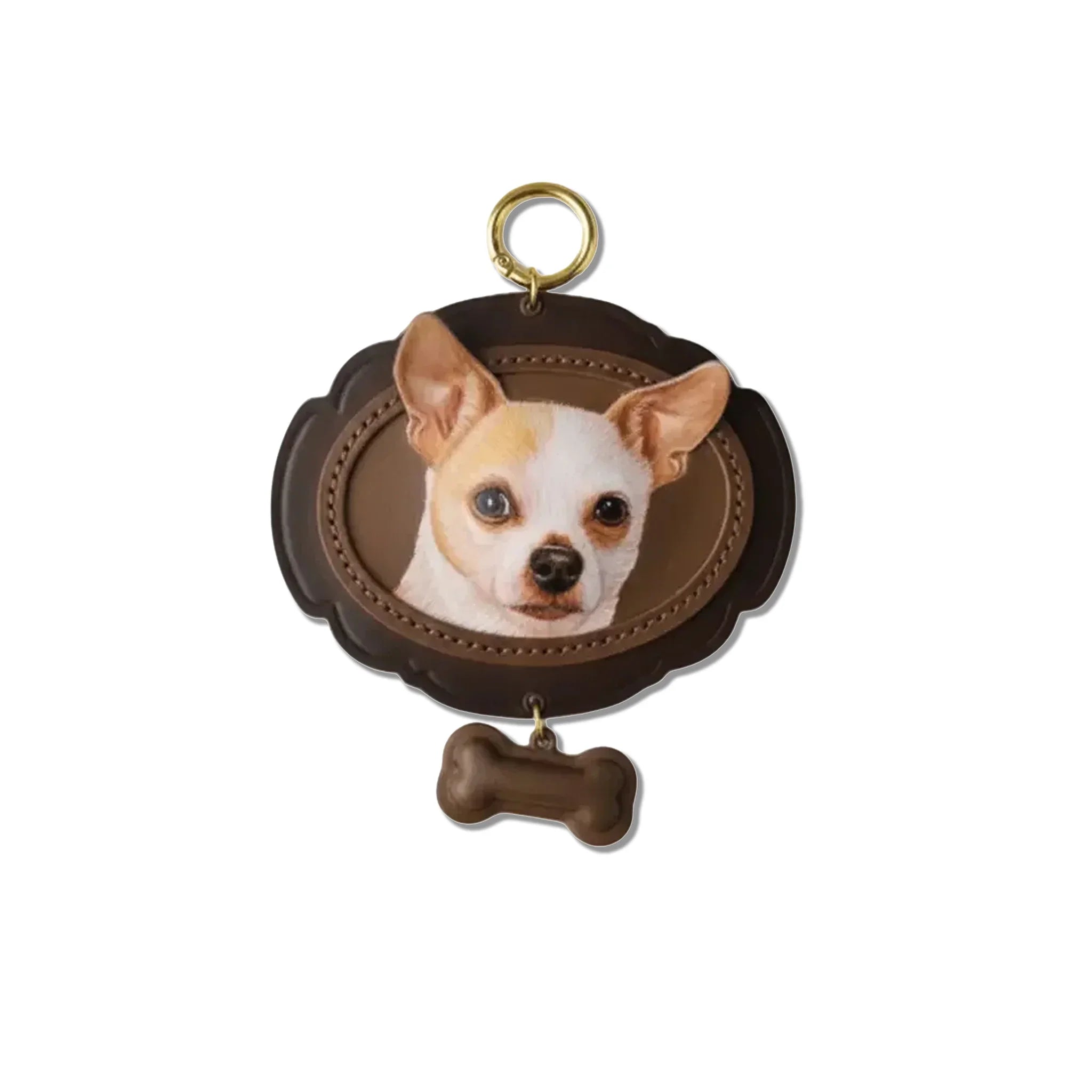 Front view of the handcrafted custom leather pet portrait keychain featuring a Chihuahua, with a matching bone charm below, on a clean white background.