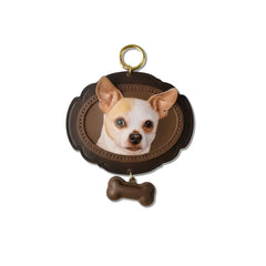 Front view of the handcrafted custom leather pet portrait keychain featuring a Chihuahua, with a matching bone charm below, on a clean white background.
