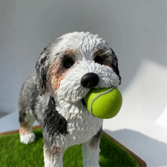 Close-up detail of the hand-sculpted fur texture and soulful eyes on a custom dog memorial statue.